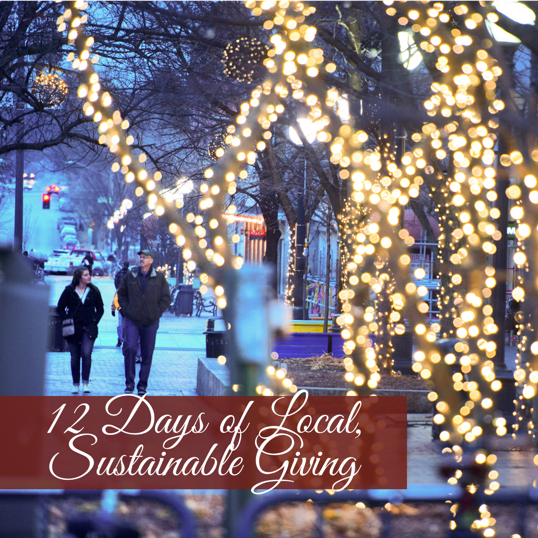 December 2017 downtown pedmall sunset featuring a tree with holiday lights on it