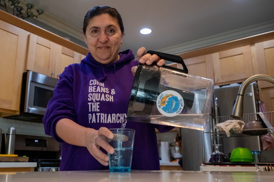 University of Iowa professor Silvia Secchi is shown using a Britta filter in her home in Iowa City on Monday, Nov. 22nd, 2021.