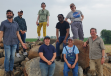 Researchers standing on boulders