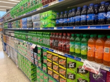 grocery store aisle of pop