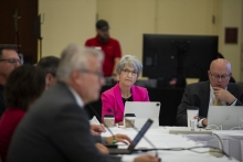 Board of regents president Sherry Bates listens to a finance presentation during a board meeting at the Iowa State Alumni Buildi