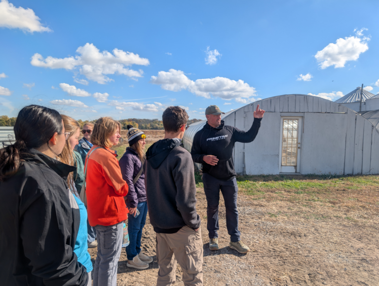 Matt Kroul gives a tour to UI students