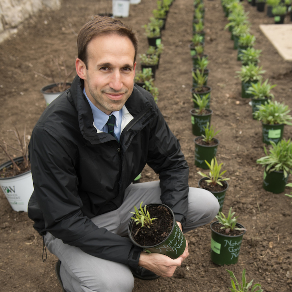 Stratis Giannakouros planting a garden