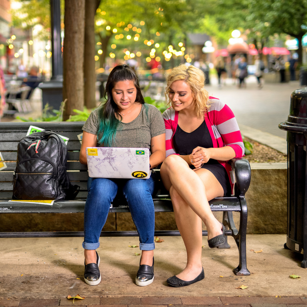 People on a bench downtown