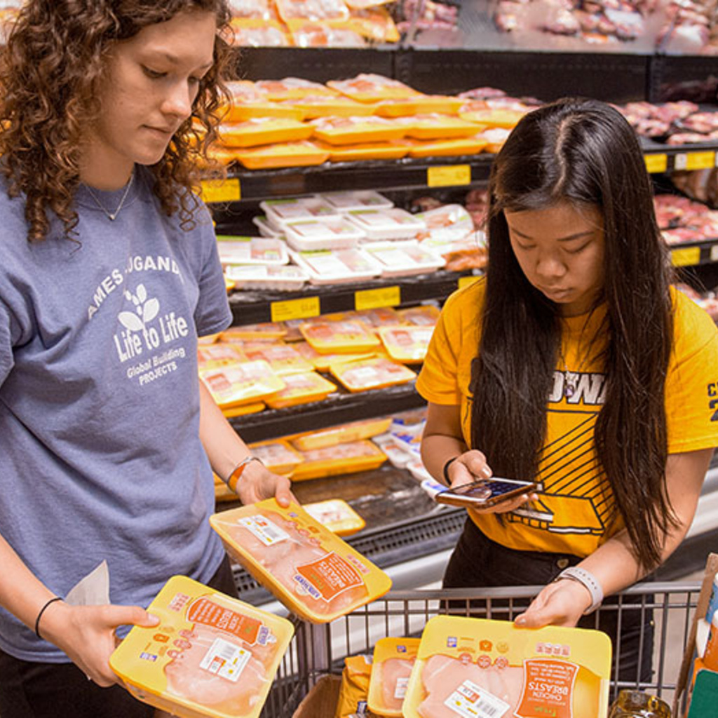 Students shopping for groceries for food pantry
