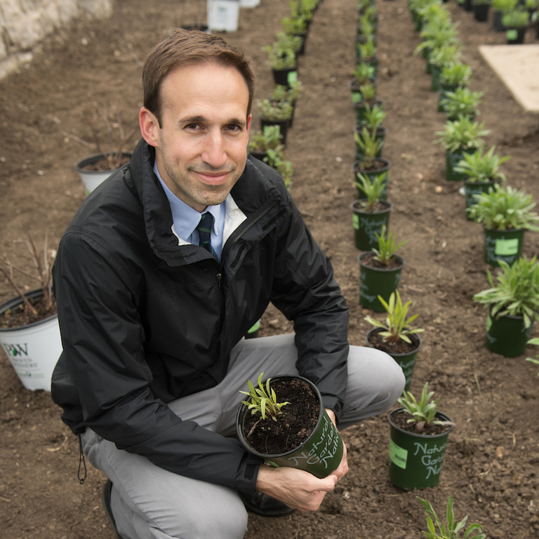Stratis Giannakouros planting a garden