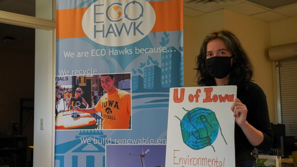University of Iowa environmental groups and state environmental council react to Climate Change Clock projected in Manhattan, New York.