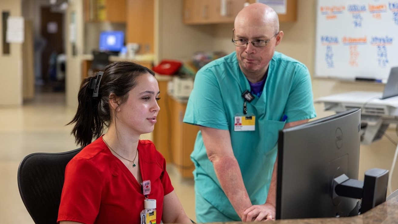 Nurses at computer